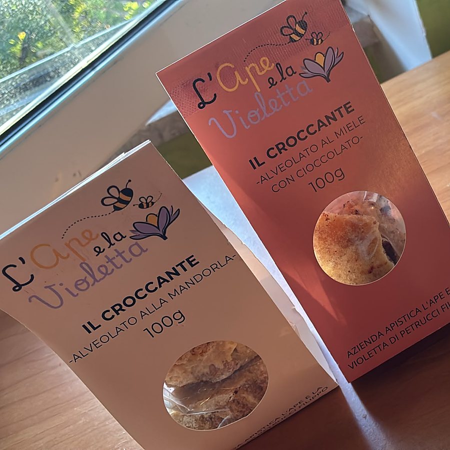 Le confezioni del croccante alveolato alla mandorla e al miele con cioccolato